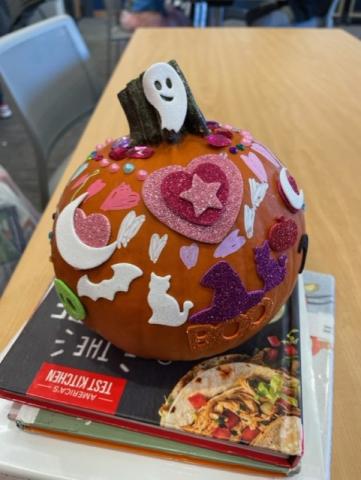 mini pumpkin decorated with glitter stickers 