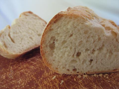 An image of white bread cut in half so you can see the the crumb.