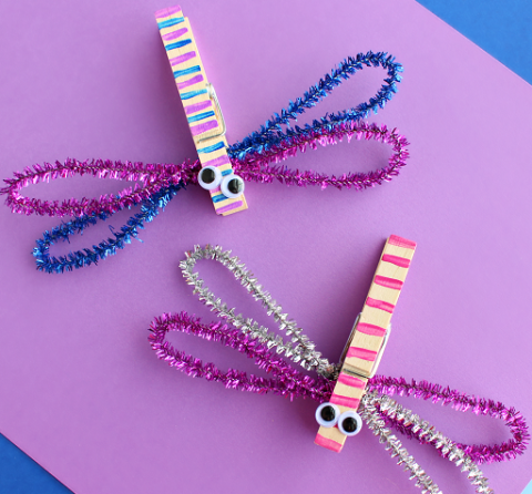 dragon flies made from clothespins and pipe cleaners with paint and googly eyes