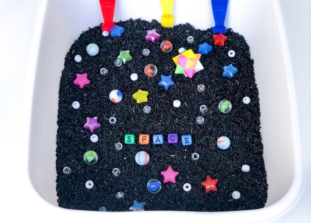 space themed sensory bin