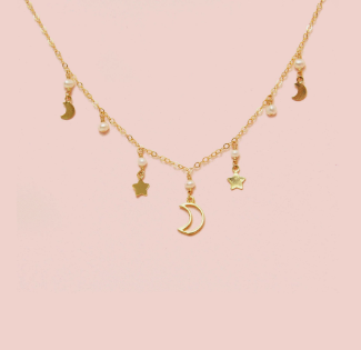 Necklace with stars and moon charms.