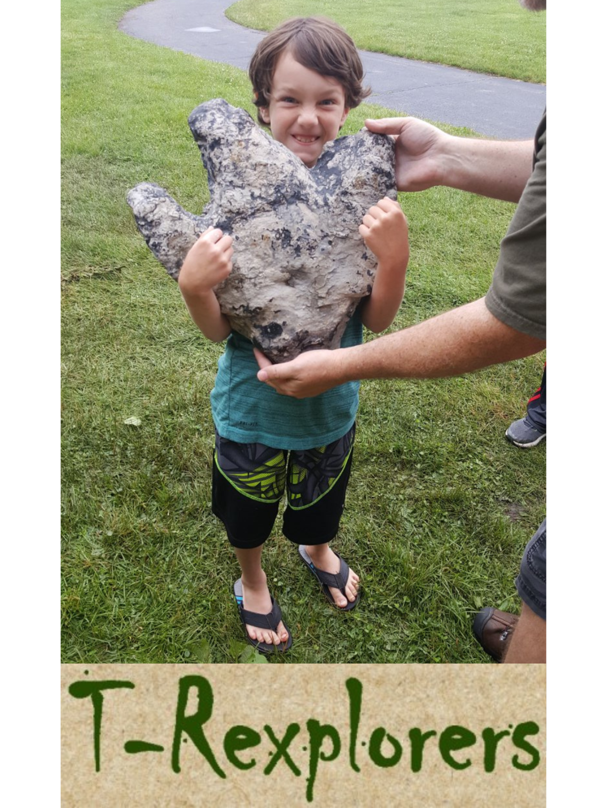 child holding a fossil